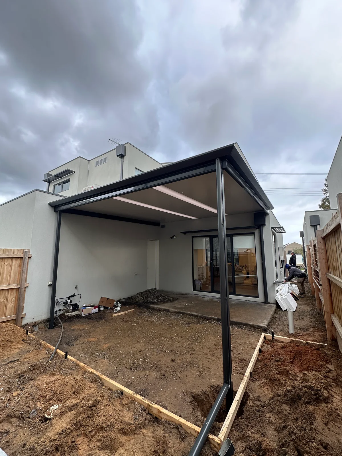 Thunder Stratco Outback Cooldek patio at a Lynbrook townhouse
