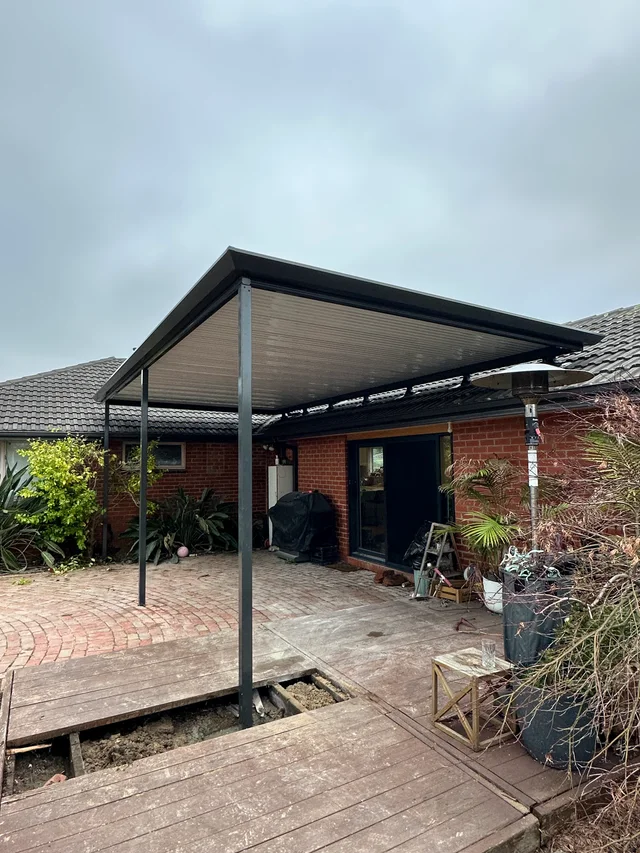 Thunder flat patio roof connected to the existing tiled roof