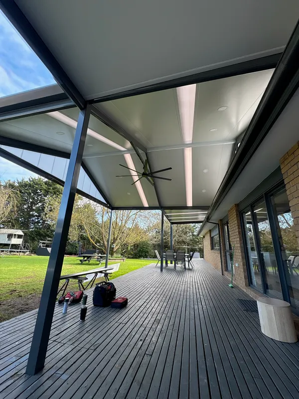 Cooldek patio ceiling with Rooflite strips, downlights and ceiling fan