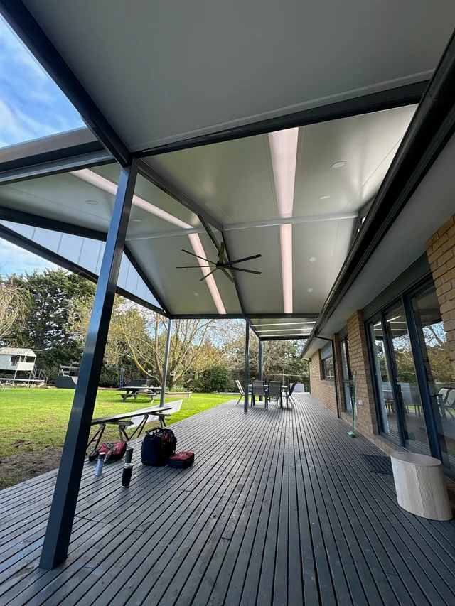Cooldek patio ceiling with Rooflite strips, downlights and ceiling fan