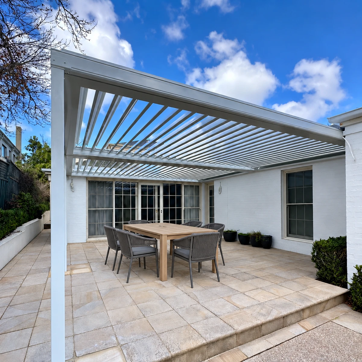 White Stratco Outback Sunroof Courtyard in Canterbury